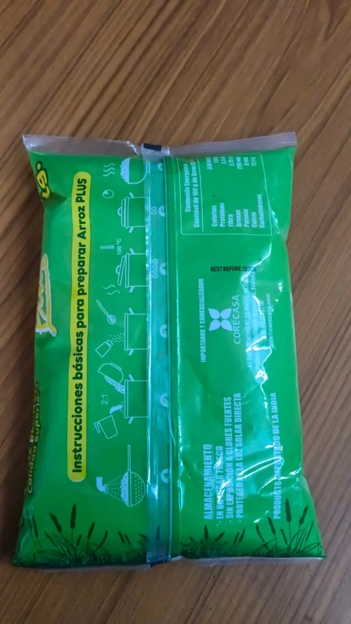 Reverse of the Plus Arroz Blanco 1 kg pouch showing cooking instructions, storage notes and nutrition table in Spanish