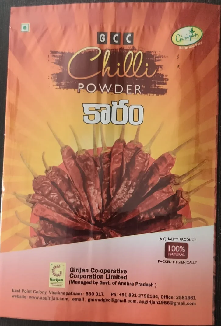 GCC Girijan chilli powder pack showing dried red chillies fanned out on an orange background